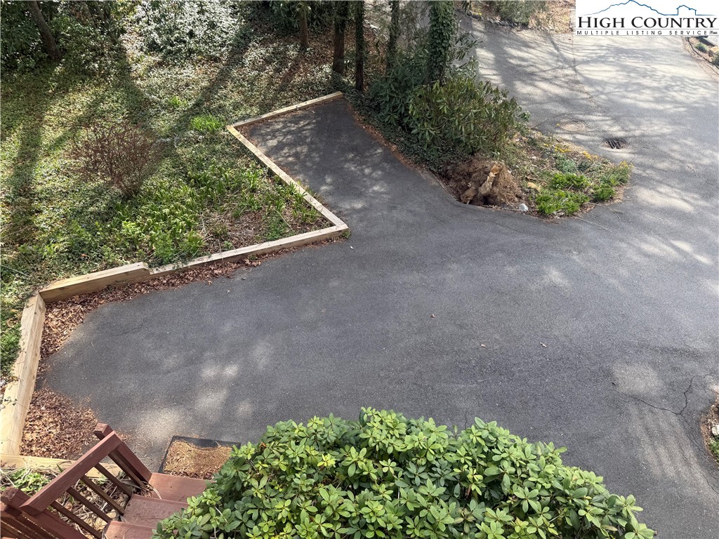 174 Spruce Pine Road Newland, NC 28657 - Photo 7 of 41 a view of a back yard of the house