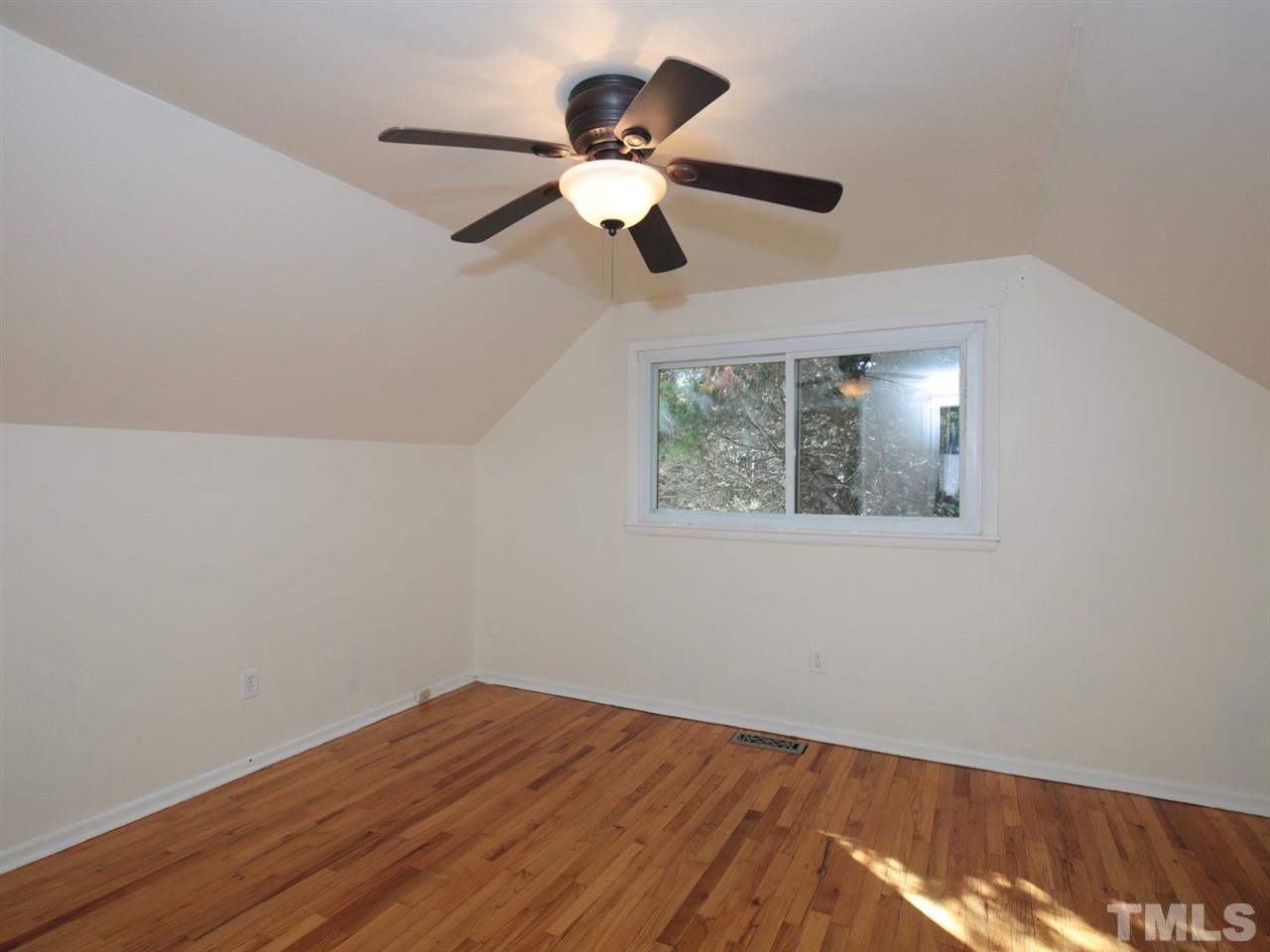3421 Cheyenne Road Raleigh, NC 27609 - Photo 19 of 25 a view of empty room with wooden floor