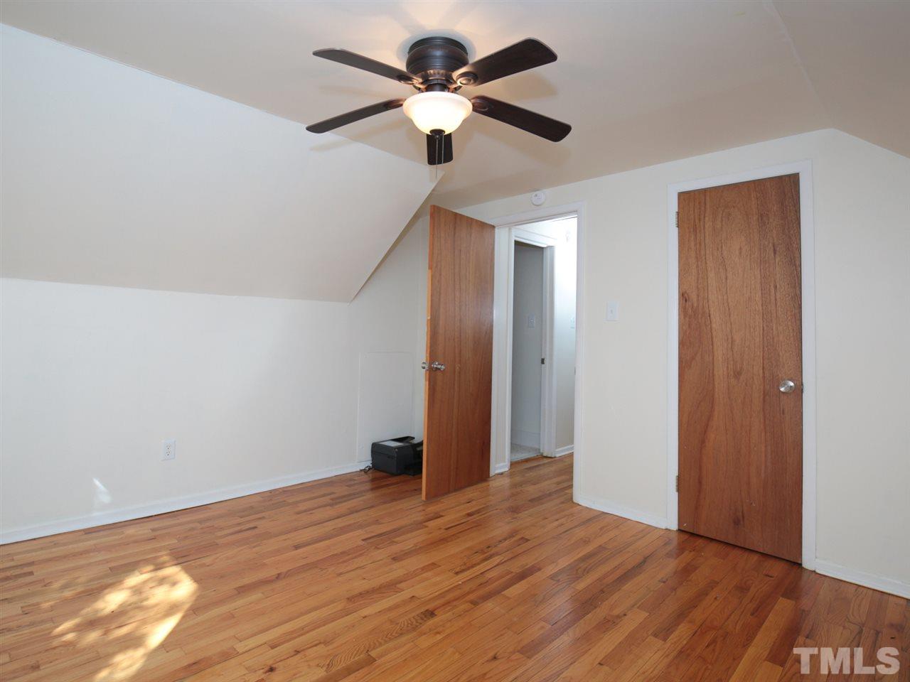 3421 Cheyenne Road Raleigh, NC 27609 - Photo 20 of 25 a view of empty room with wooden floor