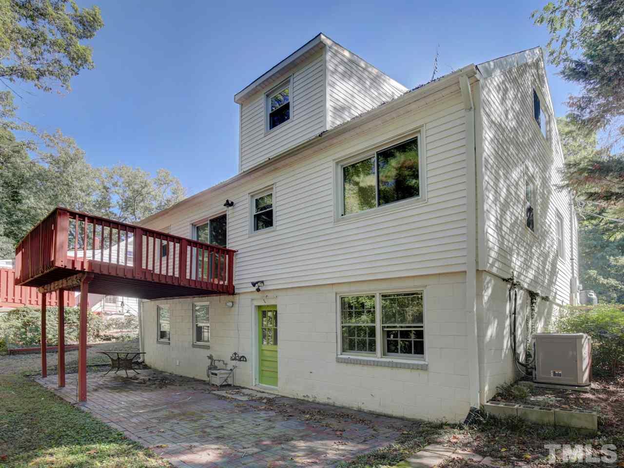 3421 Cheyenne Road Raleigh, NC 27609 - Photo 24 of 25 a view of a house with a yard