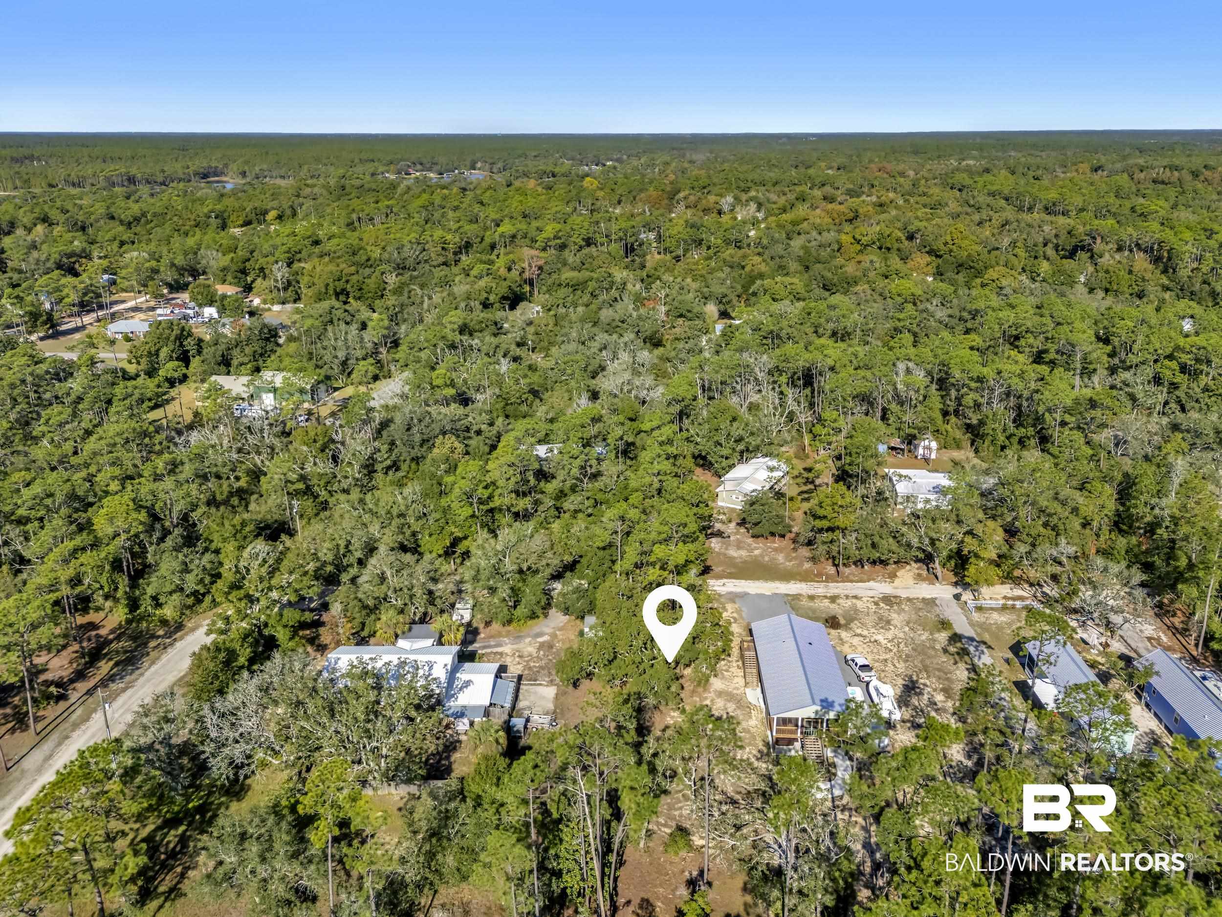 Pine Street Elberta, AL 36530 - Photo 9 of 13 View of property location featuring a heavily wooded area