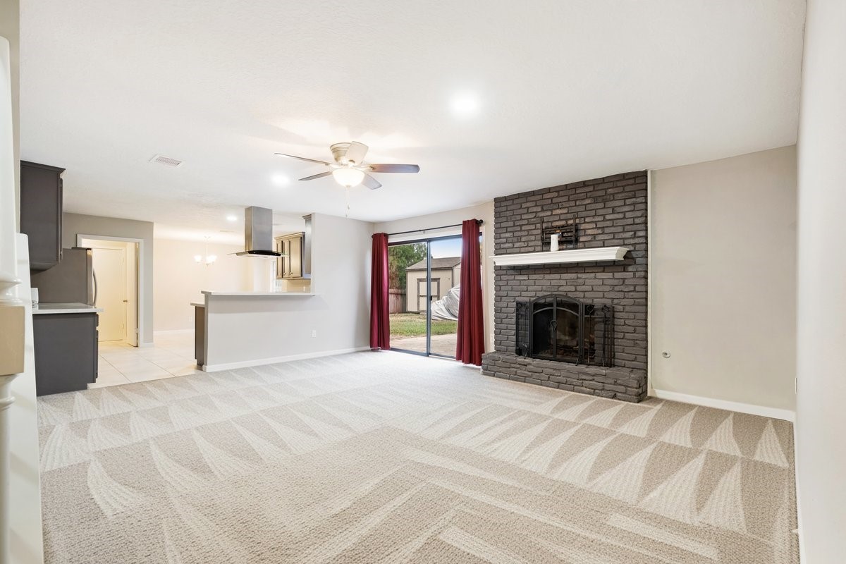 1403 Neptune Lane Houston, TX 77062 - Photo 4 of 20 a view of a livingroom with a fireplace