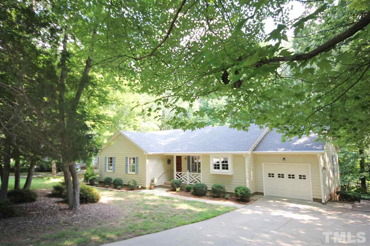5305 Ridgeloch Place Raleigh, NC 27612 - Photo 1 of 23 a view of a house with a tree in front of it