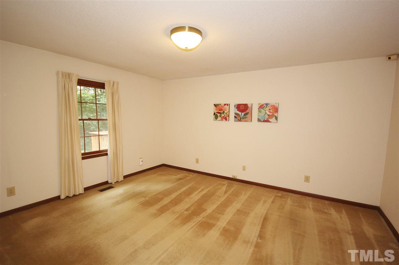 5305 Ridgeloch Place Raleigh, NC 27612 - Photo 13 of 23 a view of an empty room