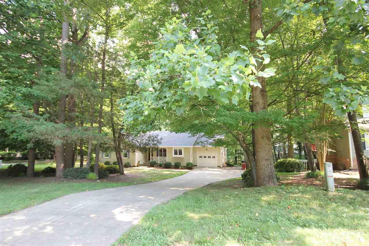 5305 Ridgeloch Place Raleigh, NC 27612 - Photo 21 of 23 a view of a house with a yard