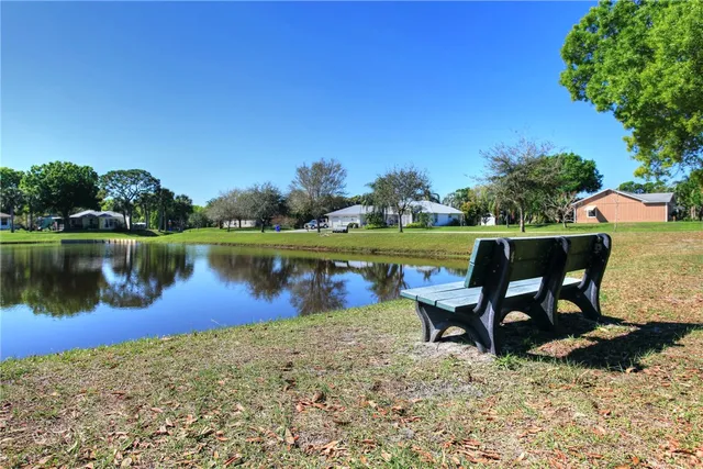a view of a bench in a backyard