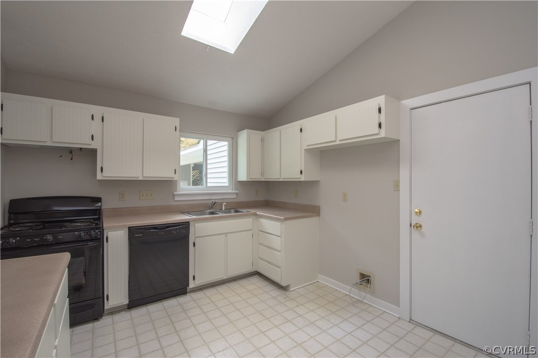 10634 Ramshorn Road Midlothian, VA 23113 - Photo 15 of 41 a kitchen with white cabinets and a sink