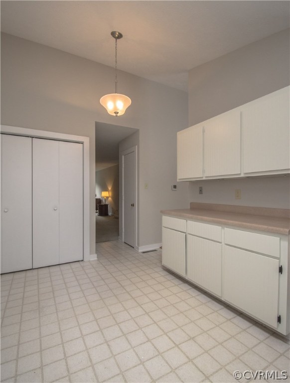 10634 Ramshorn Road Midlothian, VA 23113 - Photo 18 of 41 a view of a kitchen with dishwasher and white cabinets
