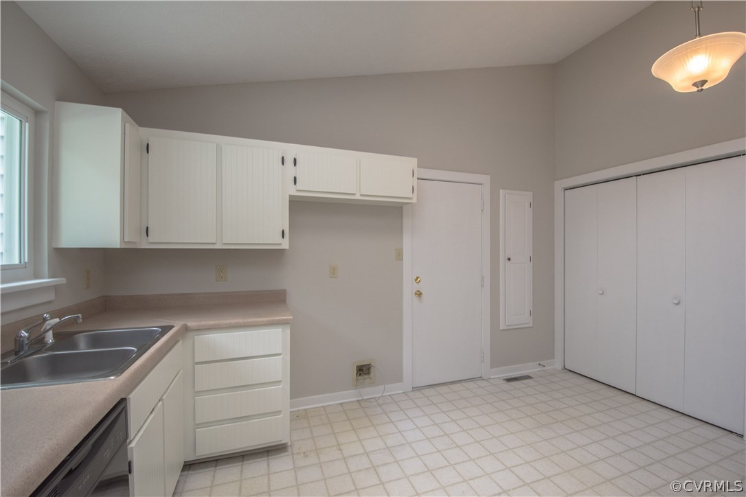 10634 Ramshorn Road Midlothian, VA 23113 - Photo 19 of 41 a kitchen with a sink cabinets and appliances