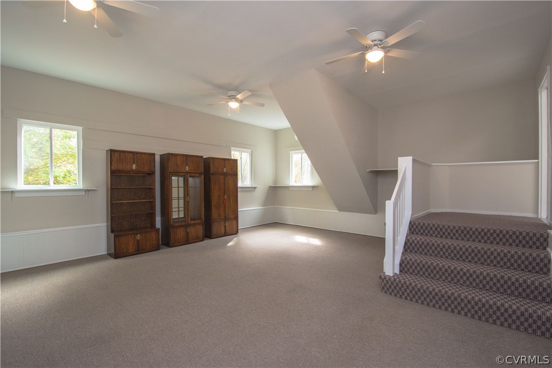 10634 Ramshorn Road Midlothian, VA 23113 - Photo 20 of 41 an empty room with windows and fan