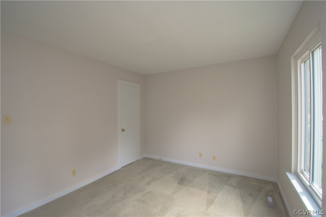10634 Ramshorn Road Midlothian, VA 23113 - Photo 22 of 41 an empty room with a window