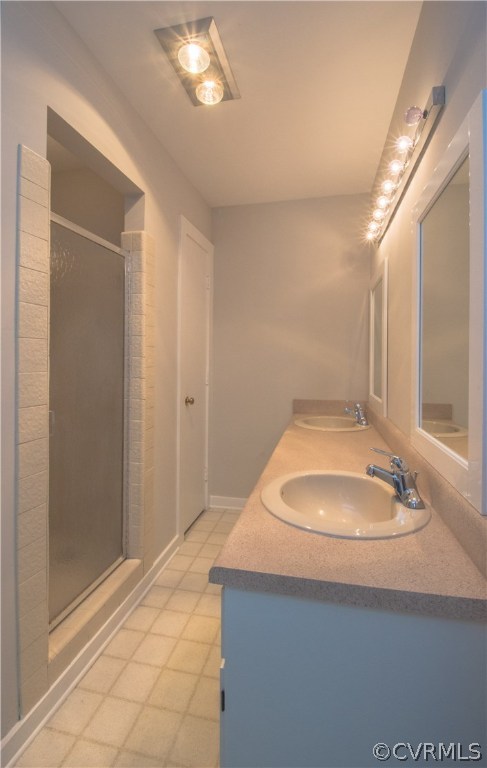 10634 Ramshorn Road Midlothian, VA 23113 - Photo 30 of 41 a bathroom with a sink and a mirror