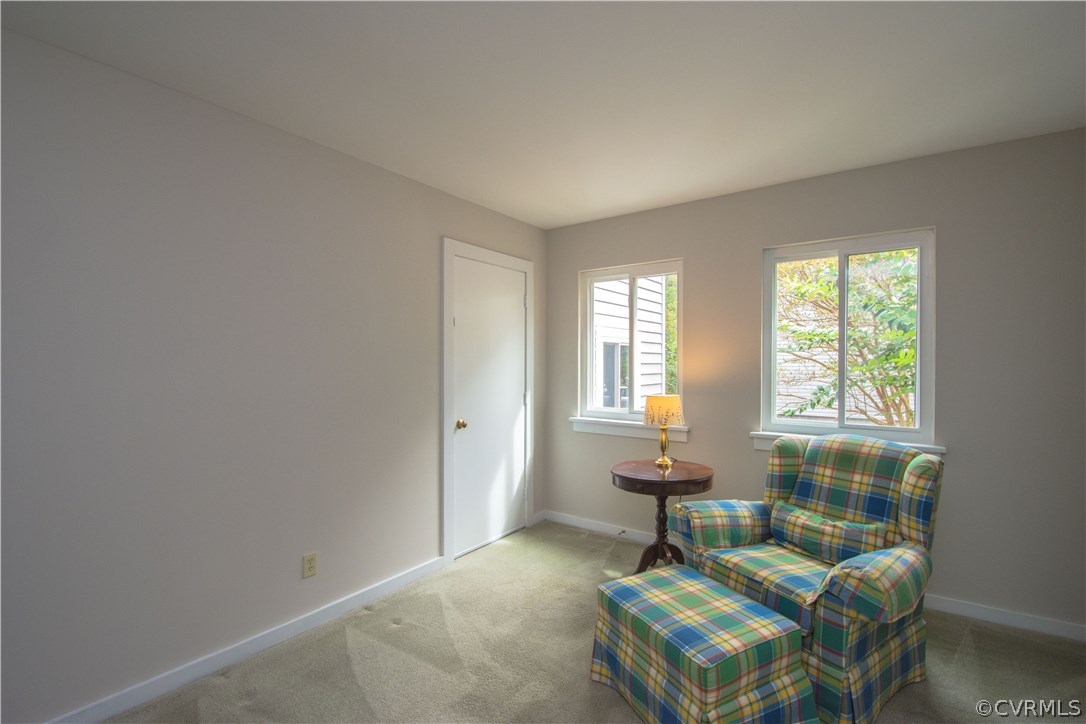 10634 Ramshorn Road Midlothian, VA 23113 - Photo 31 of 41 a living room with furniture and a window