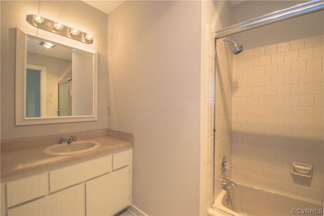 10634 Ramshorn Road Midlothian, VA 23113 - Photo 36 of 41 a bathroom with a sink and a mirror