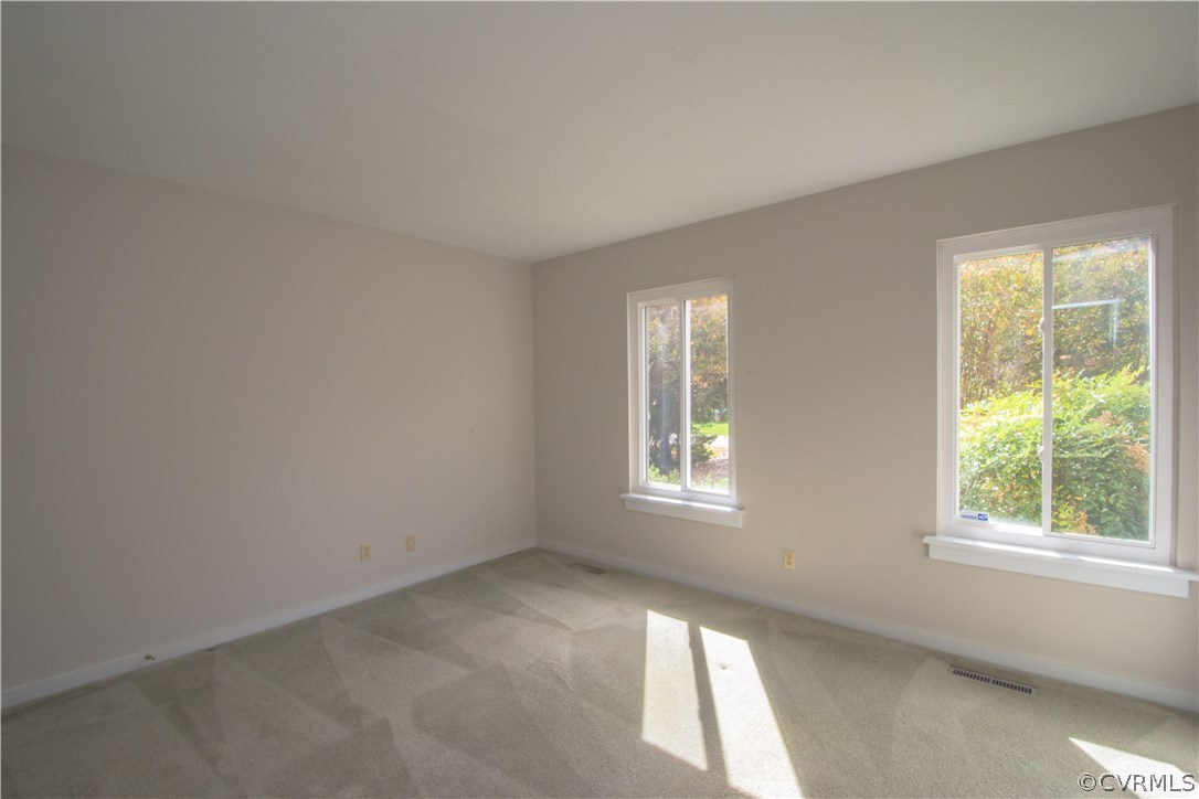 10634 Ramshorn Road Midlothian, VA 23113 - Photo 37 of 41 a view of an empty room with a window