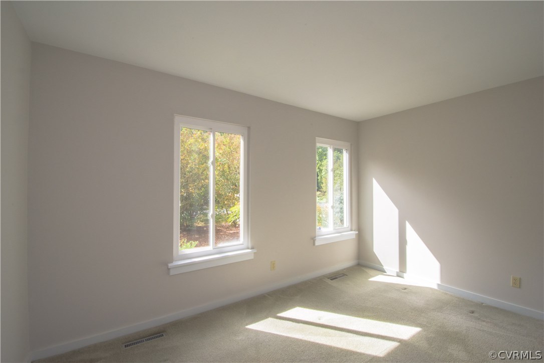 10634 Ramshorn Road Midlothian, VA 23113 - Photo 38 of 41 a view of an empty room with a window