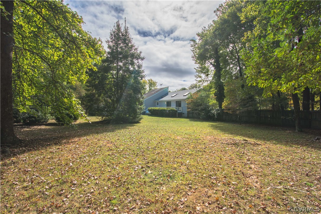 10634 Ramshorn Road Midlothian, VA 23113 - Photo 40 of 41 a view of a yard with an trees