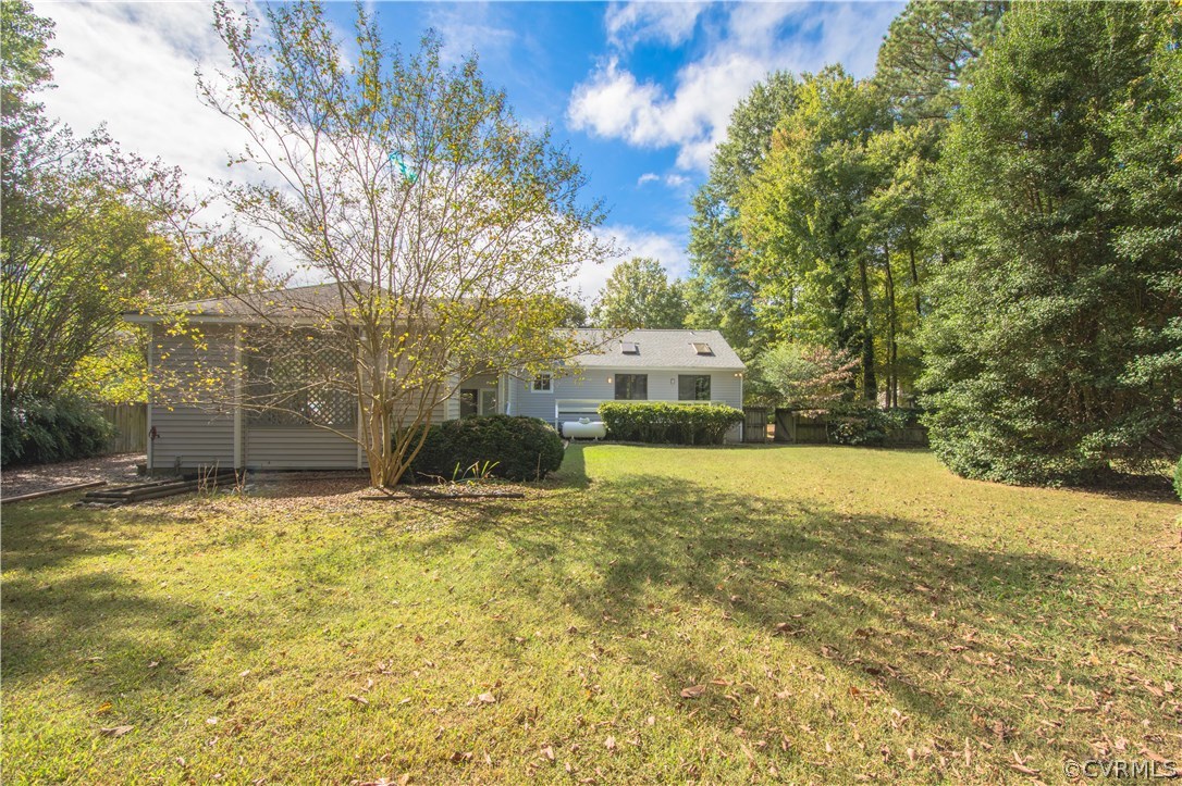 10634 Ramshorn Road Midlothian, VA 23113 - Photo 41 of 41 a view of a swimming pool with a yard