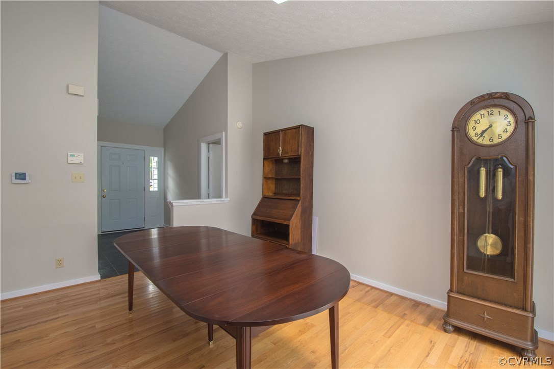 10634 Ramshorn Road Midlothian, VA 23113 - Photo 10 of 41 a view of a room with furniture and wooden floor