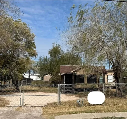 a view of outdoor space and backyard