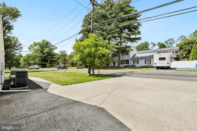 a view of a street with houses