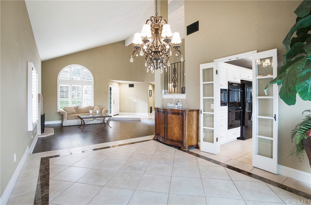 16 Bethany Laguna Niguel, CA 92677 - Photo 13 of 38 a view of open kitchen with granite countertop lots of counter top space and living room