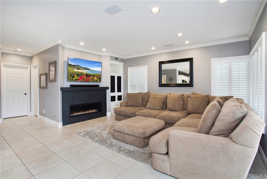 16 Bethany Laguna Niguel, CA 92677 - Photo 16 of 38 a living room with furniture and a flat screen tv