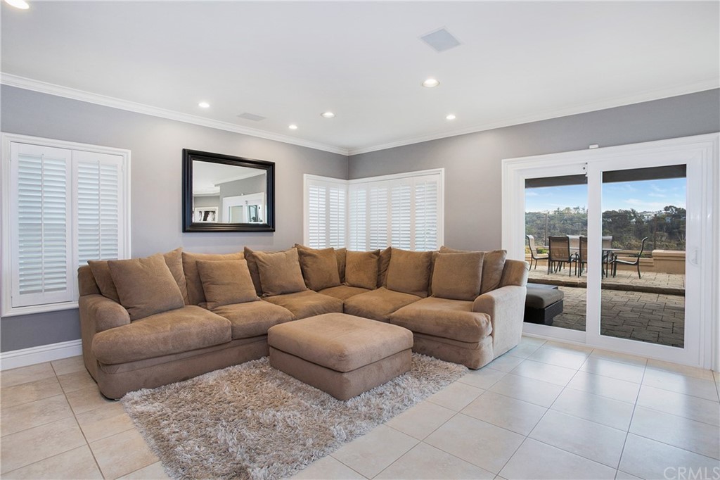 16 Bethany Laguna Niguel, CA 92677 - Photo 17 of 38 a living room with furniture and a large window