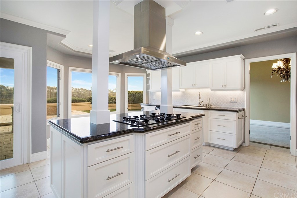 16 Bethany Laguna Niguel, CA 92677 - Photo 19 of 38 a kitchen with stainless steel appliances granite countertop a sink and cabinets