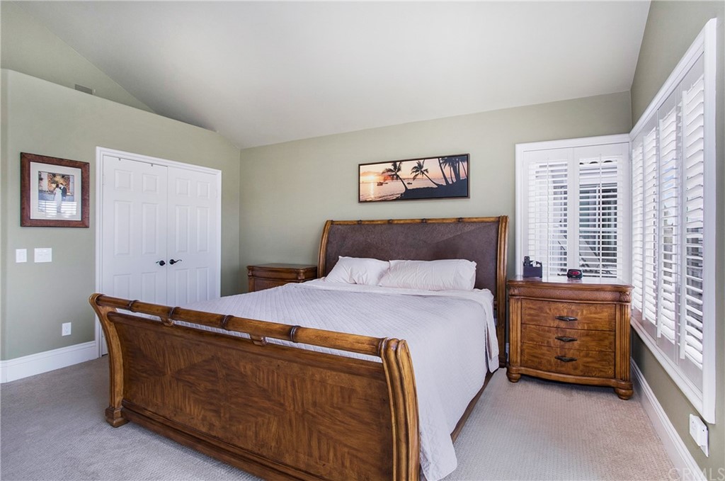16 Bethany Laguna Niguel, CA 92677 - Photo 23 of 38 a bedroom with a bed and a window