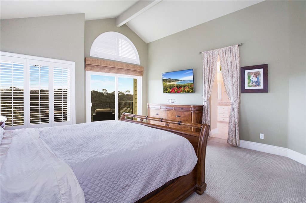16 Bethany Laguna Niguel, CA 92677 - Photo 24 of 38 a bedroom with a bed and a large window