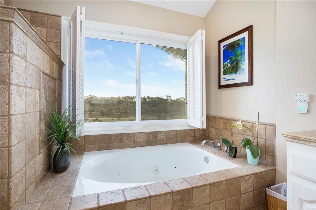 16 Bethany Laguna Niguel, CA 92677 - Photo 27 of 38 a bath tub sitting next to a window