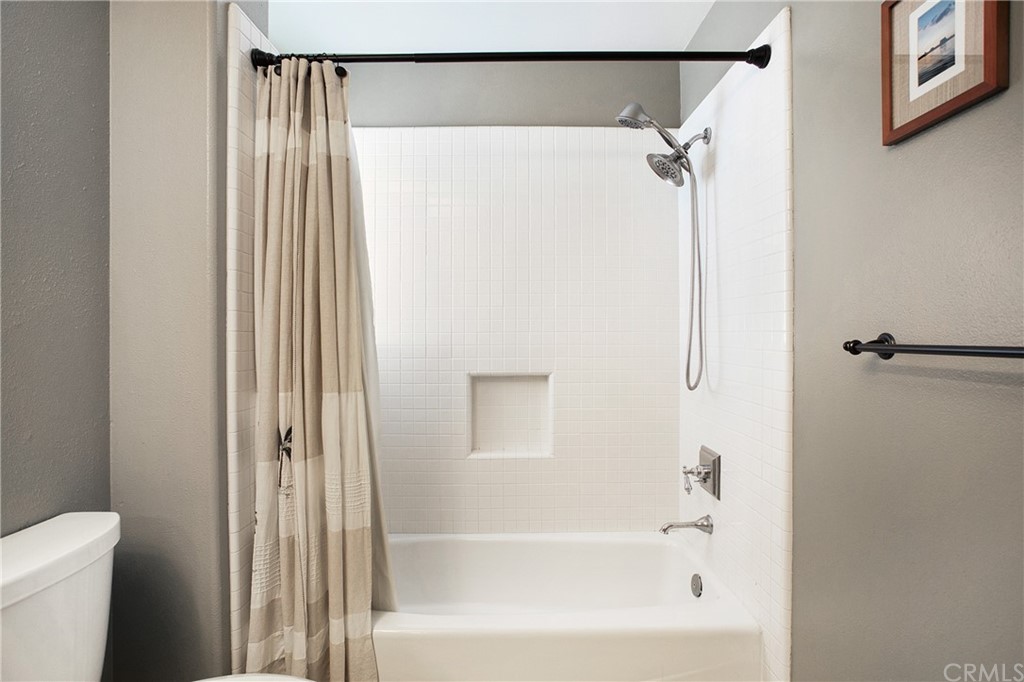 16 Bethany Laguna Niguel, CA 92677 - Photo 30 of 38 a bathroom with a bathtub and a shower