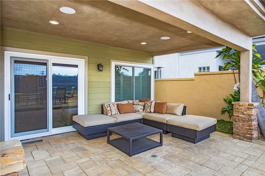 16 Bethany Laguna Niguel, CA 92677 - Photo 7 of 38 a living room with patio furniture and a large window