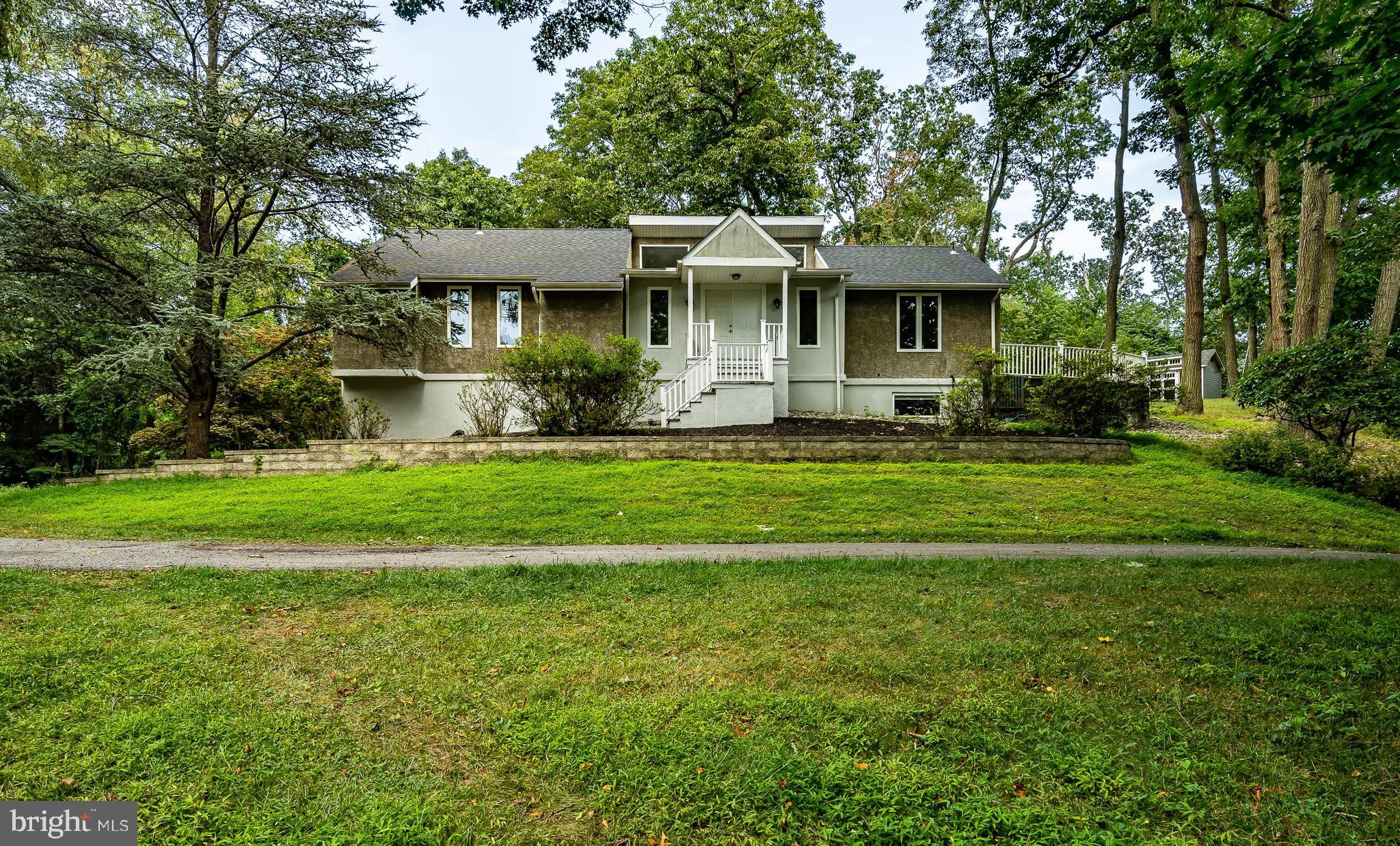 145 Sunset Hollow Road West Chester, PA 19380 - Photo 2 of 27 Exterior front showing driveway