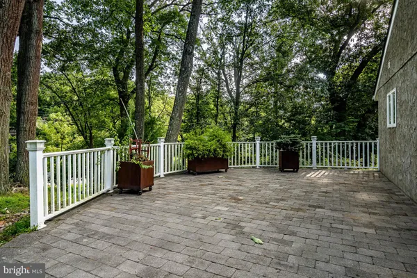 a view of a backyard with a trees