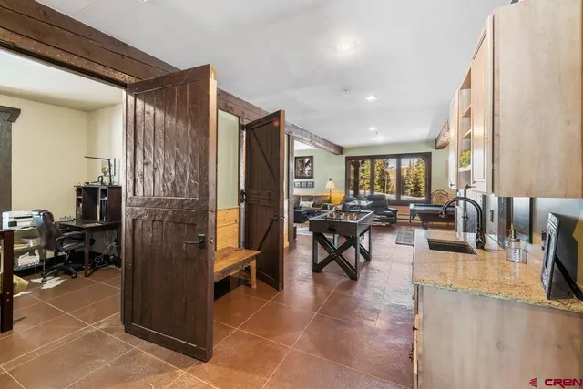 a bedroom with bed and furniture