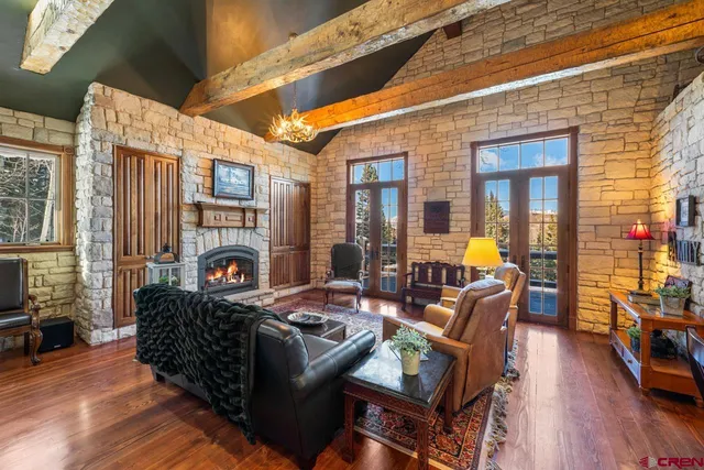 a outdoor living space with furniture and a fireplace