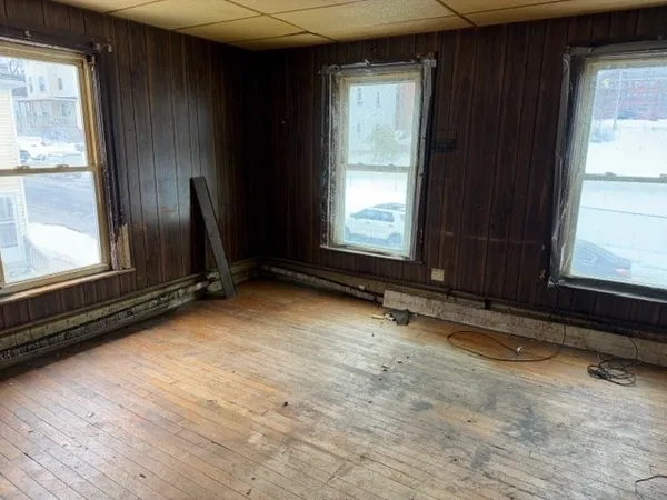 en empty room with windows