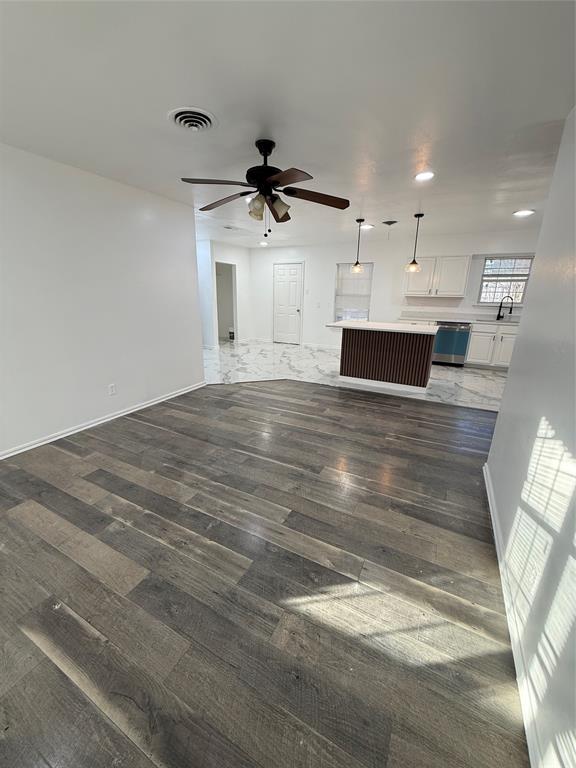 2529 Rutgers Drive Irving, TX 75062 - Photo 19 of 38 a view of kitchen and hall with wooden floor