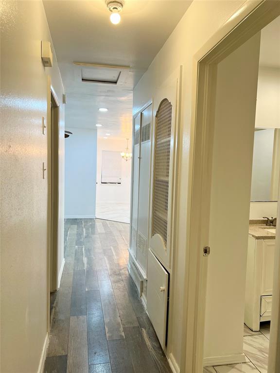 2529 Rutgers Drive Irving, TX 75062 - Photo 24 of 38 a view of a hallway with wooden floor