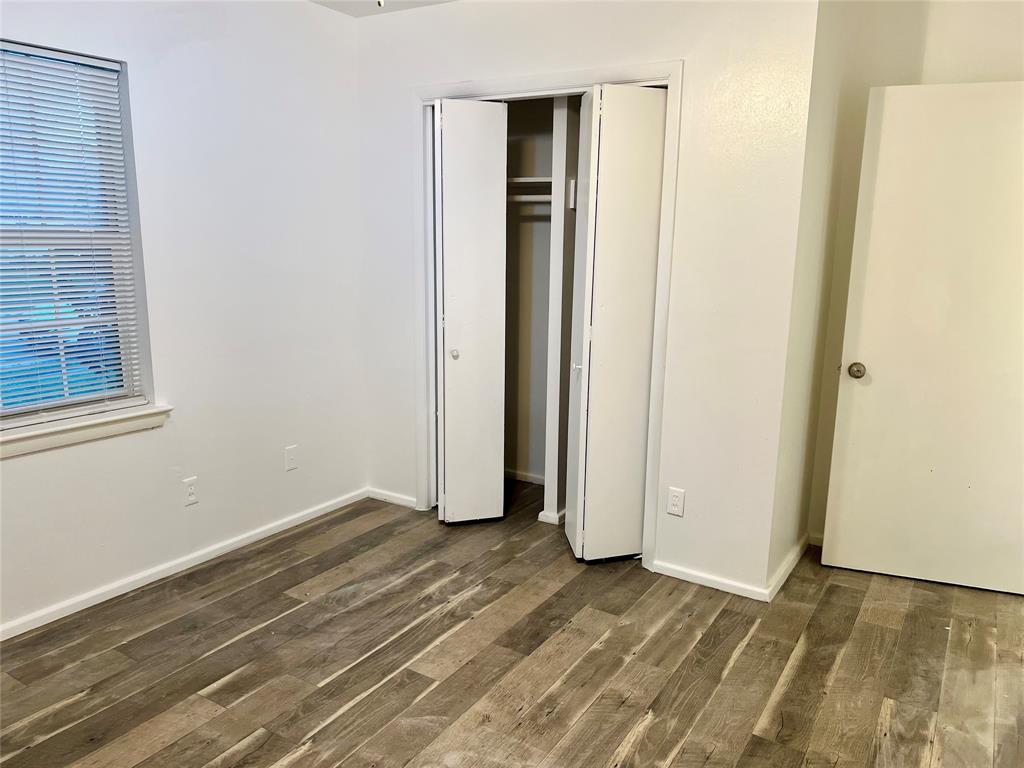 2529 Rutgers Drive Irving, TX 75062 - Photo 35 of 38 a view of an empty room with closet and a window