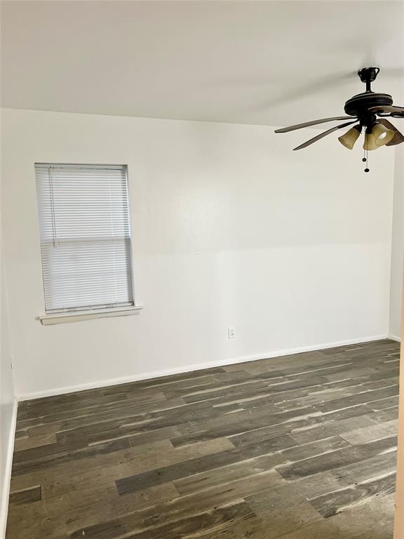 2529 Rutgers Drive Irving, TX 75062 - Photo 36 of 38 a view of a room with wooden floor and cabinet