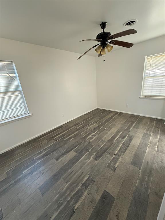 2529 Rutgers Drive Irving, TX 75062 - Photo 5 of 38 wooden floor in an empty room