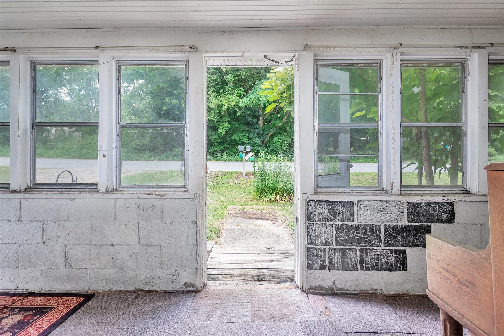 5078 Whites Bridge Road Belding, MI 48809 - Photo 8 of 46 08-5078-Whites-Bridge-Rd-WindowStill-Rea