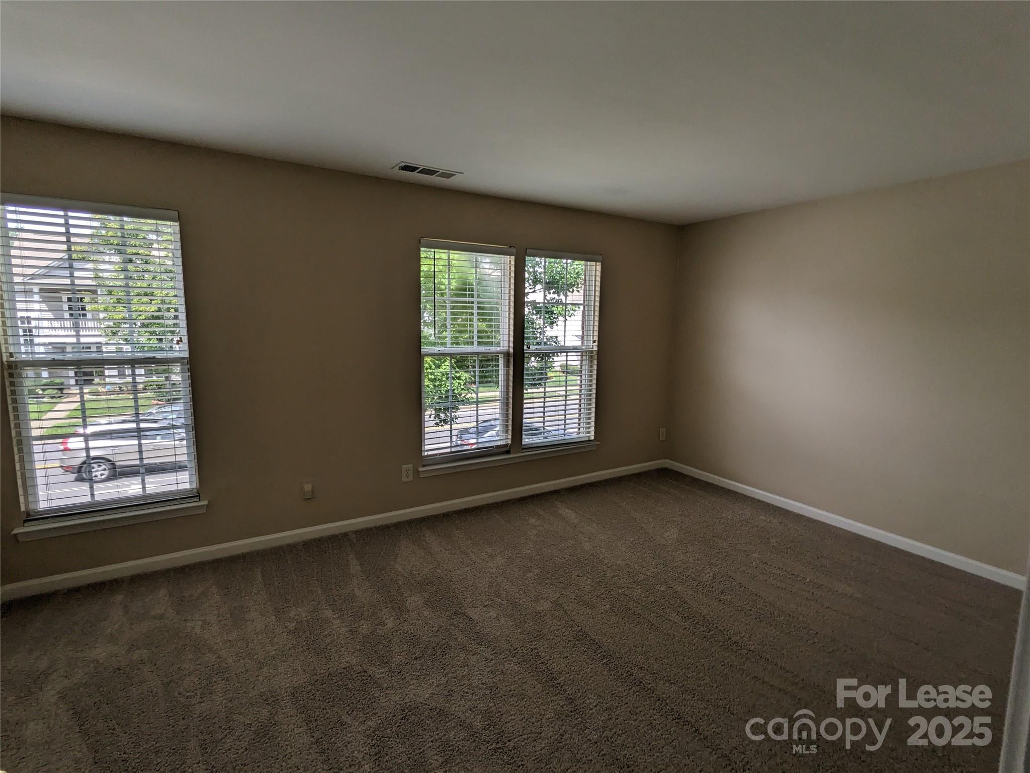 4934 Prosperity Ridge Road Charlotte, NC 28269 - Photo 13 of 15 an empty room with a window