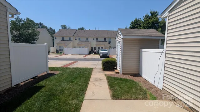 a view of a back yard of the house