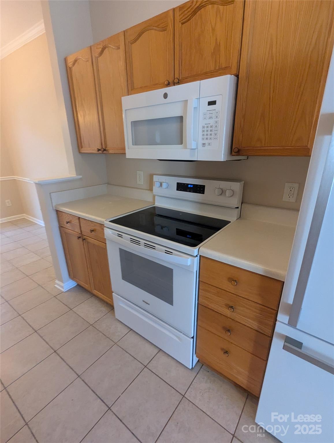4934 Prosperity Ridge Road Charlotte, NC 28269 - Photo 5 of 15 a stove top oven sitting inside of a kitchen