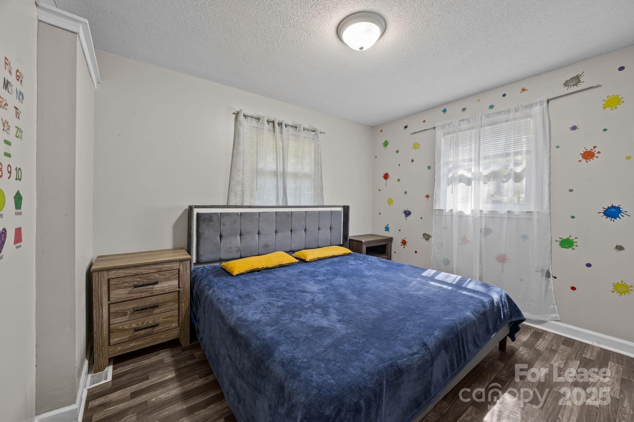 10751 Ola Drive Fort Mill, SC 29707 - Photo 13 of 22 a bedroom with a bed and a window