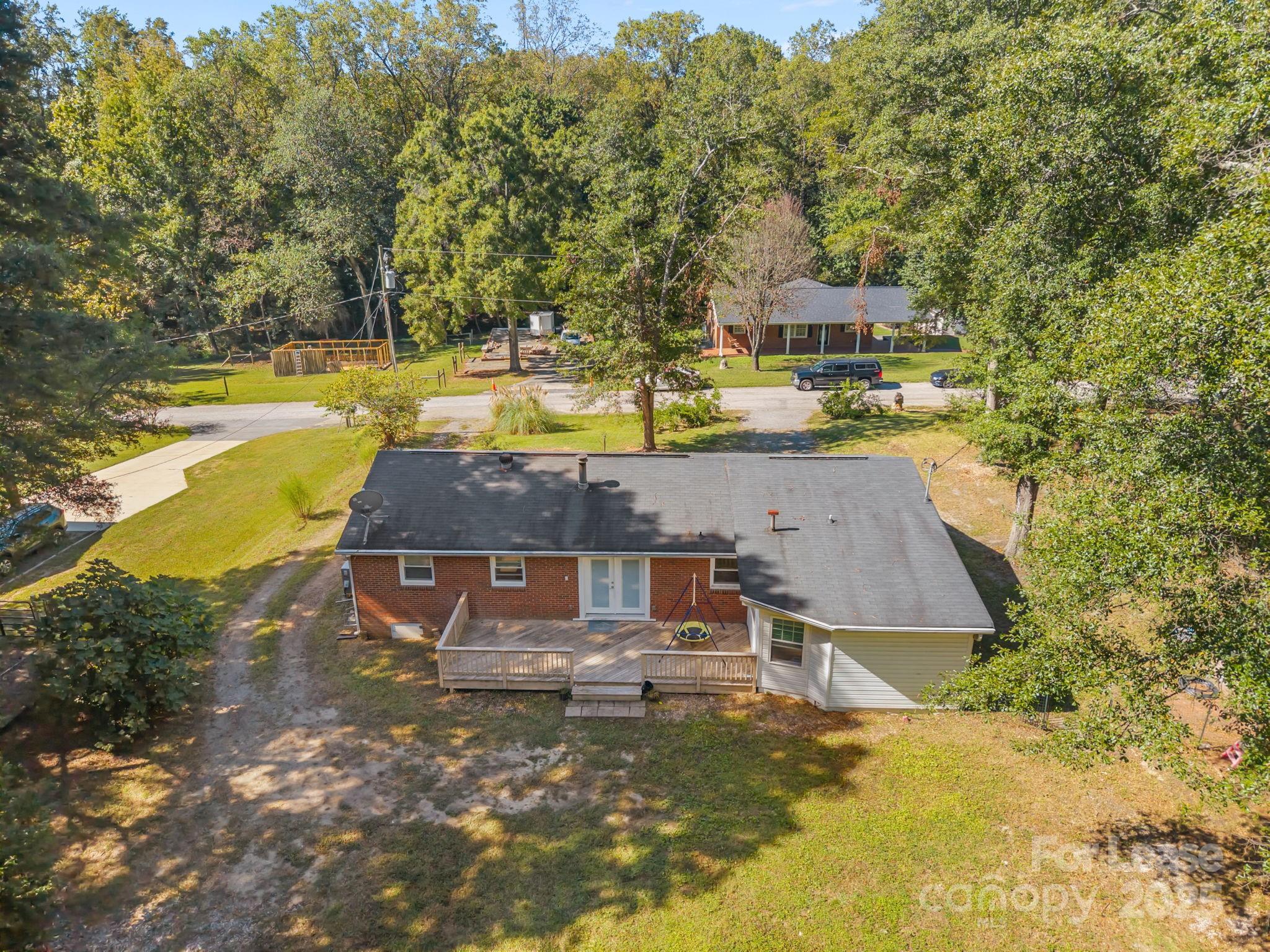 10751 Ola Drive Fort Mill, SC 29707 - Photo 14 of 22 a view of a swimming pool with a yard